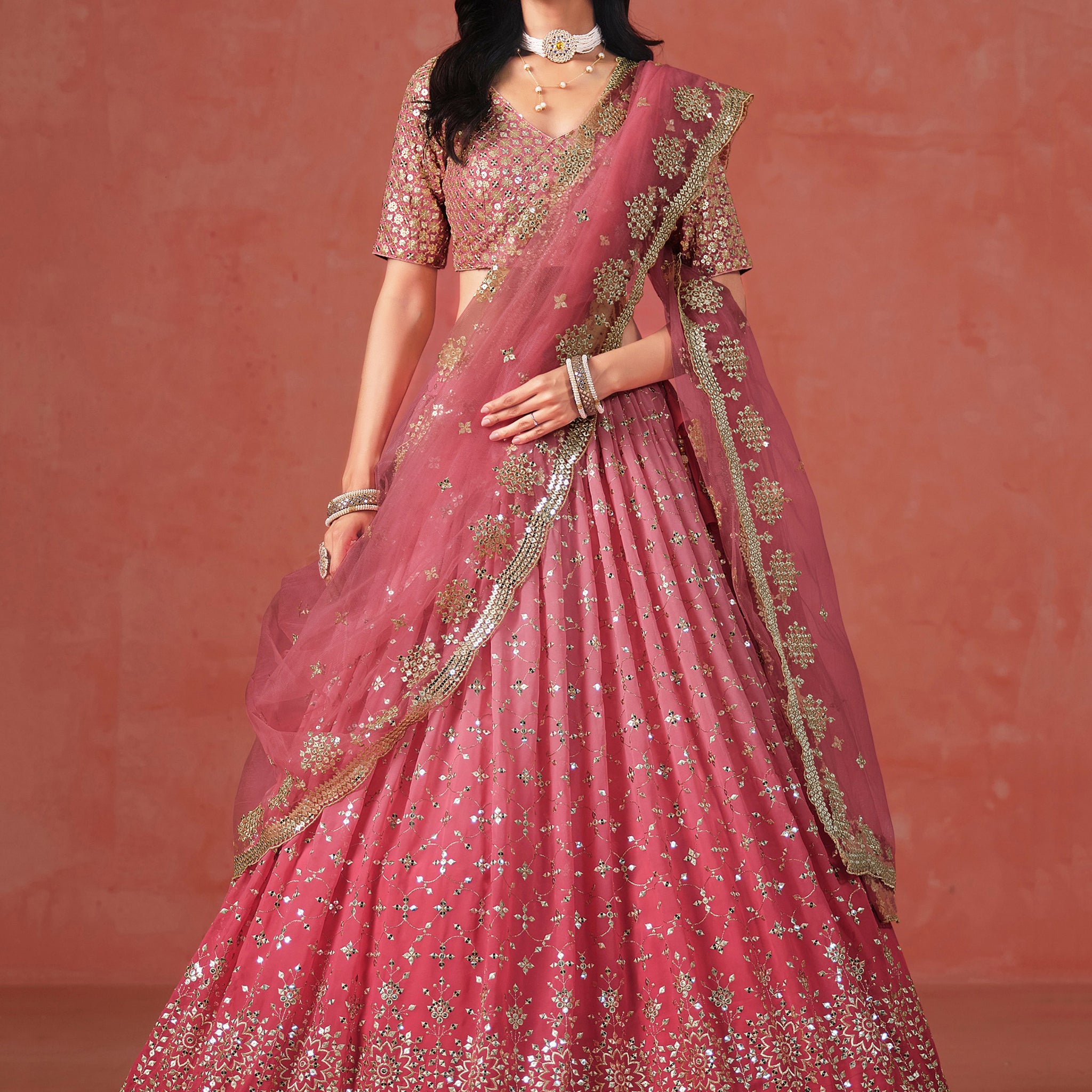 Fabulous Peach Georgette Embroidered Zari Lehenga Choli With Dupatta