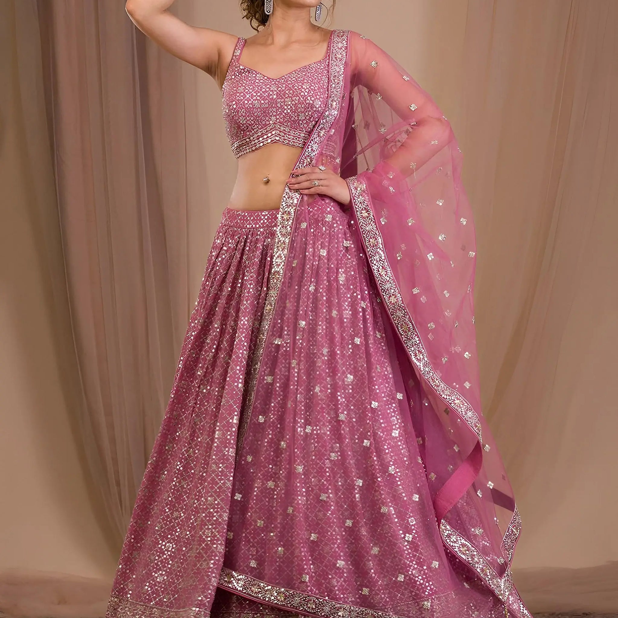 Attractive Pink Sequins Georgette Engagement Wear Lehenga Choli