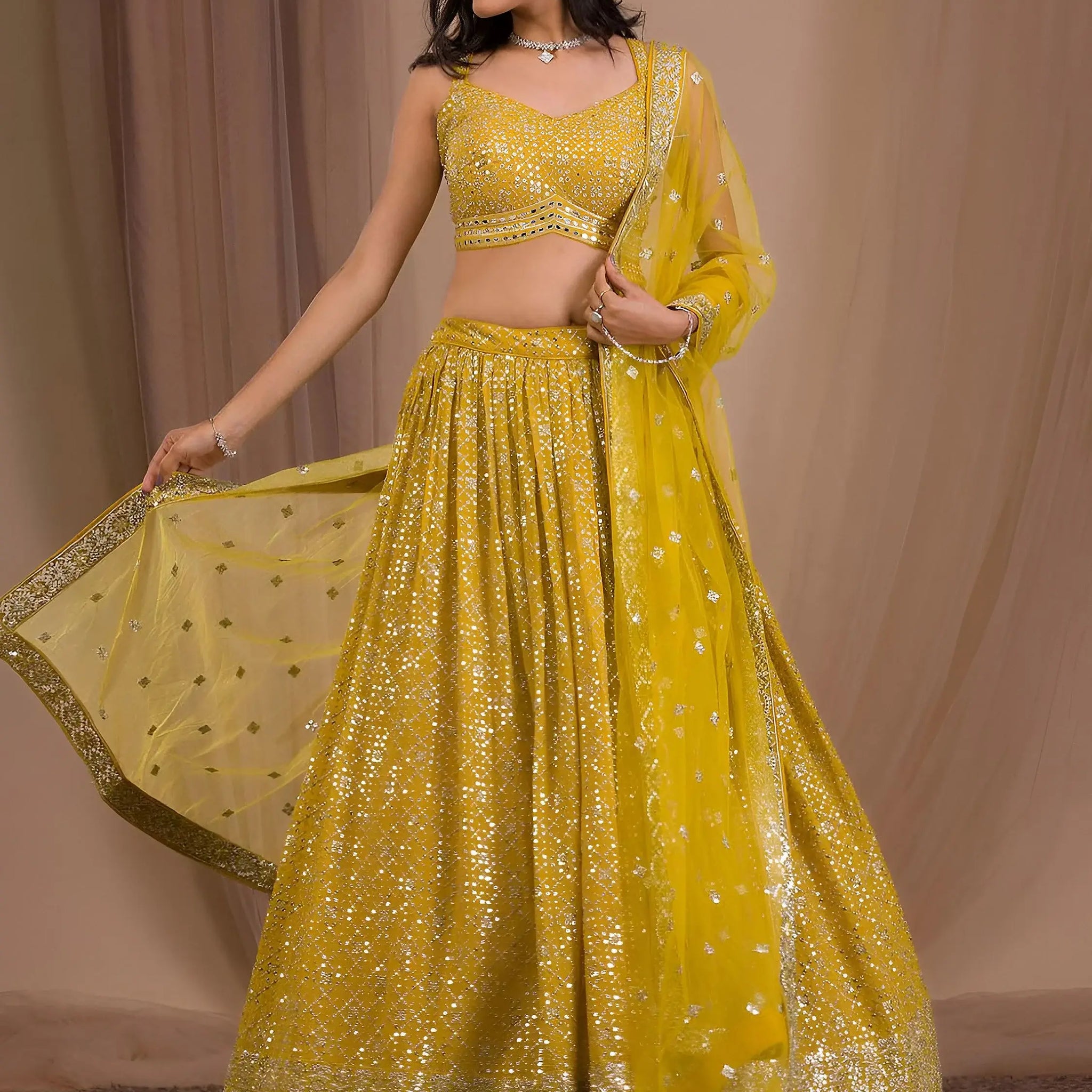 Alluring Yellow Sequins Georgette Haldi Wear Lehenga Choli