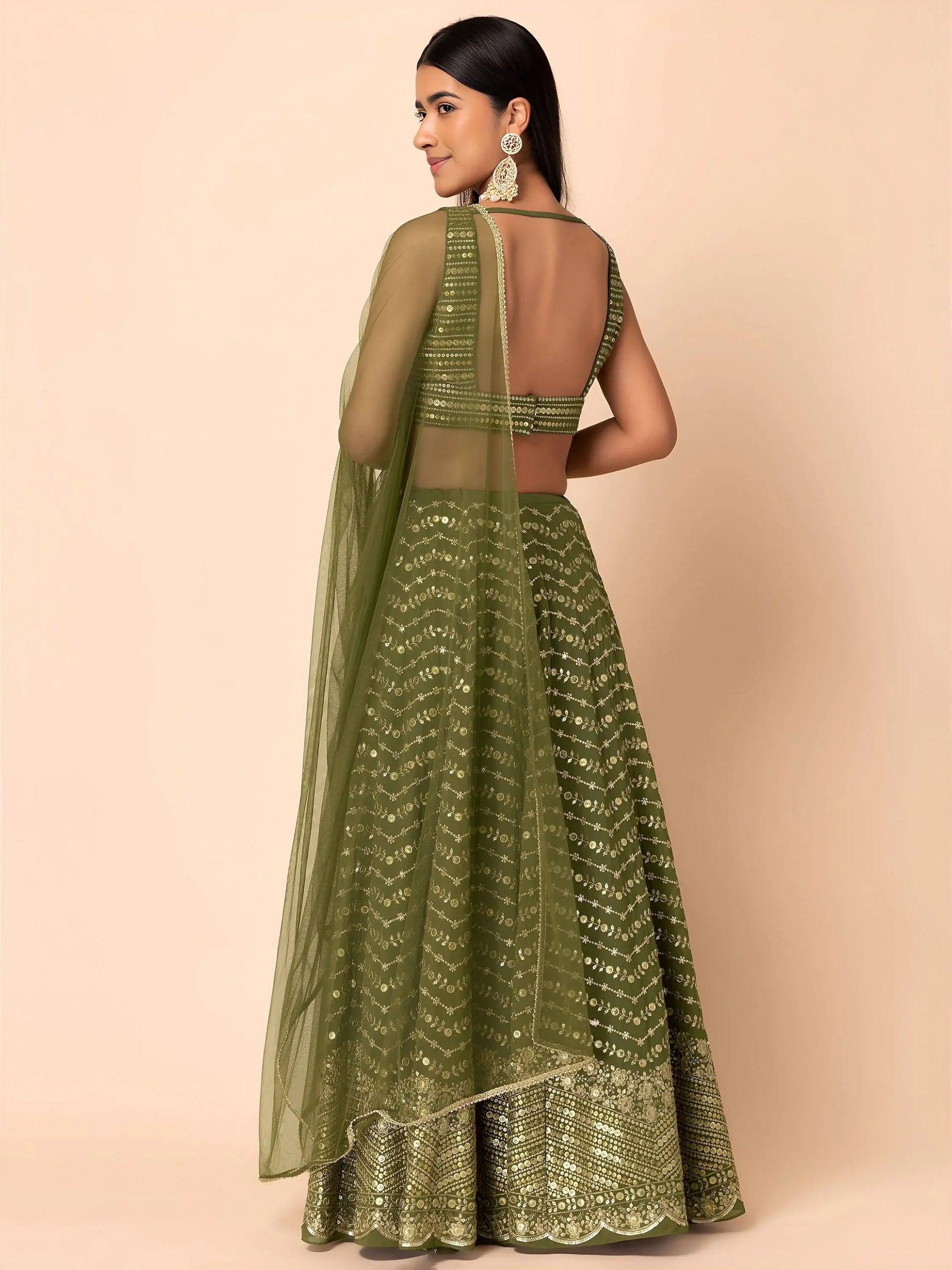 Ravishing Green Zari Embroidery Georgette Mehendi Wear Lehenga Choli