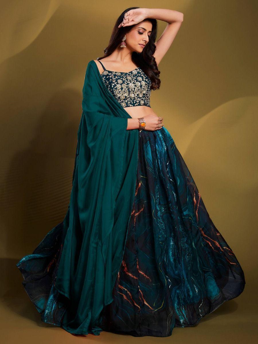 Fascinating Teal Blue Sequins Organza Party Wear Lehenga Choli