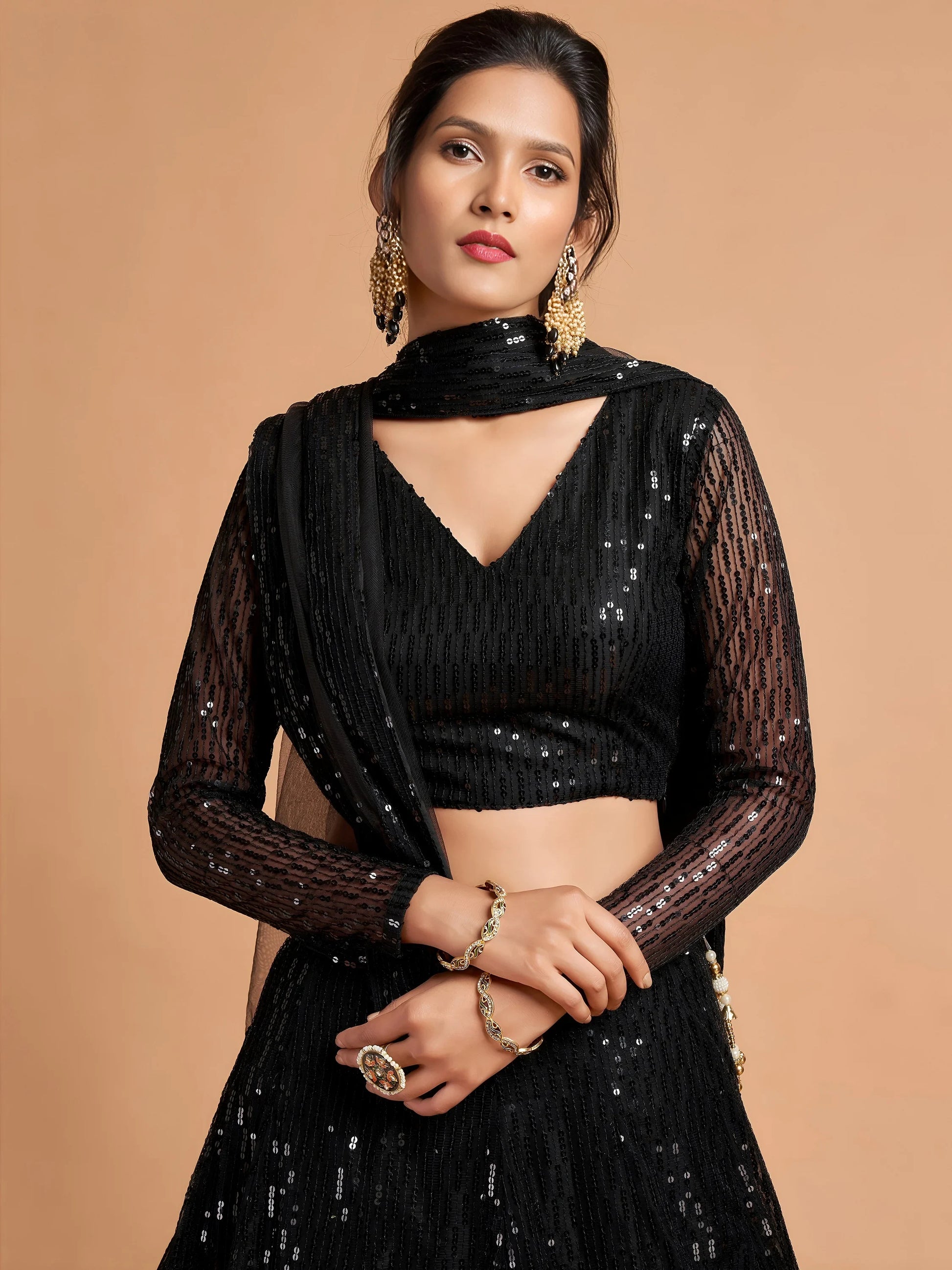 Marvelous Black Sequins Embroidered Net Party Wear Lehenga Choli