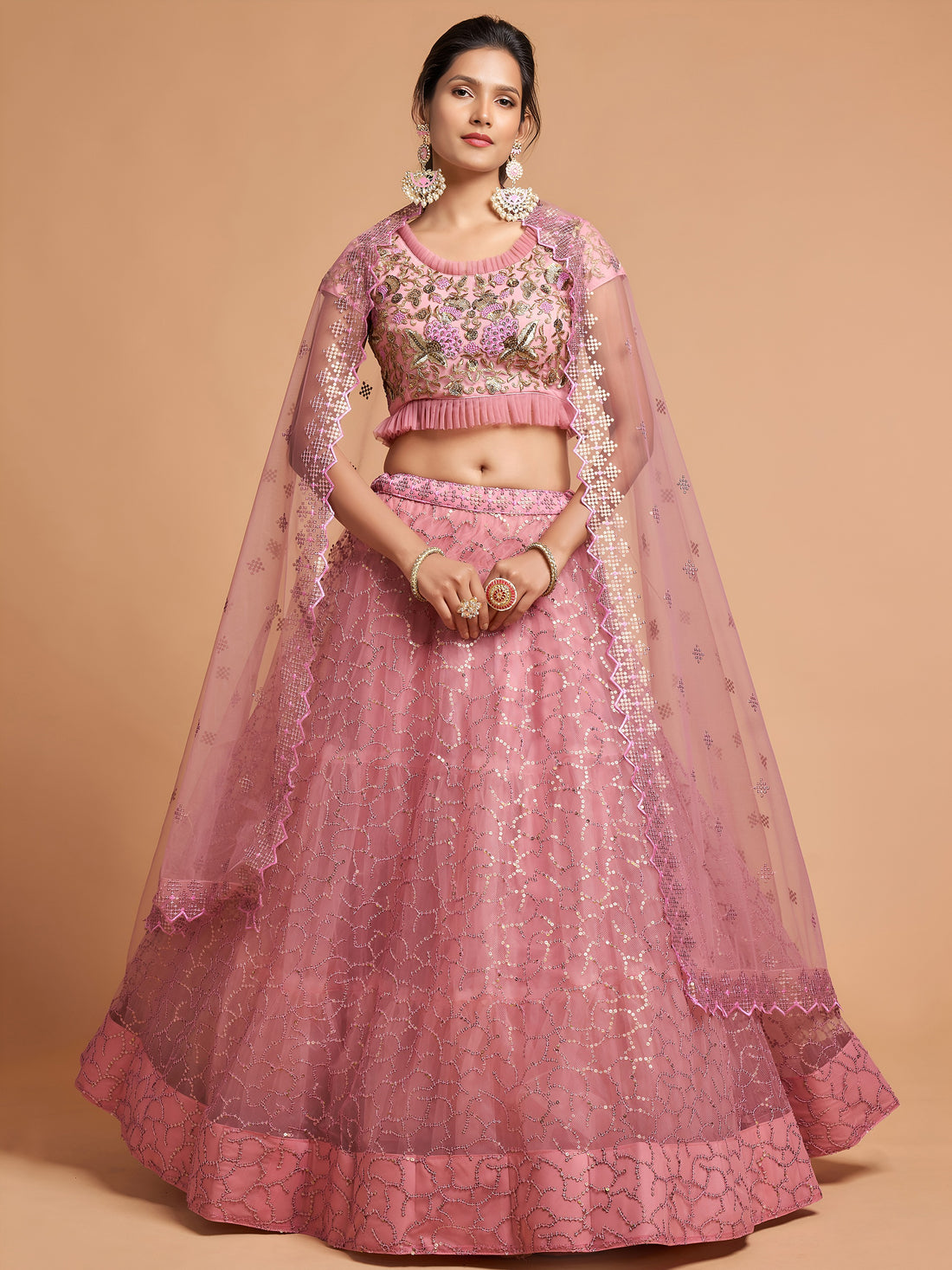 Unique Blush Pink Thread Embroidered Net Party Wear Lehenga Choli