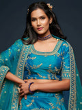 Pleasant Teal Blue Thread Embroidery Art Silk Wedding Lehenga Choli
