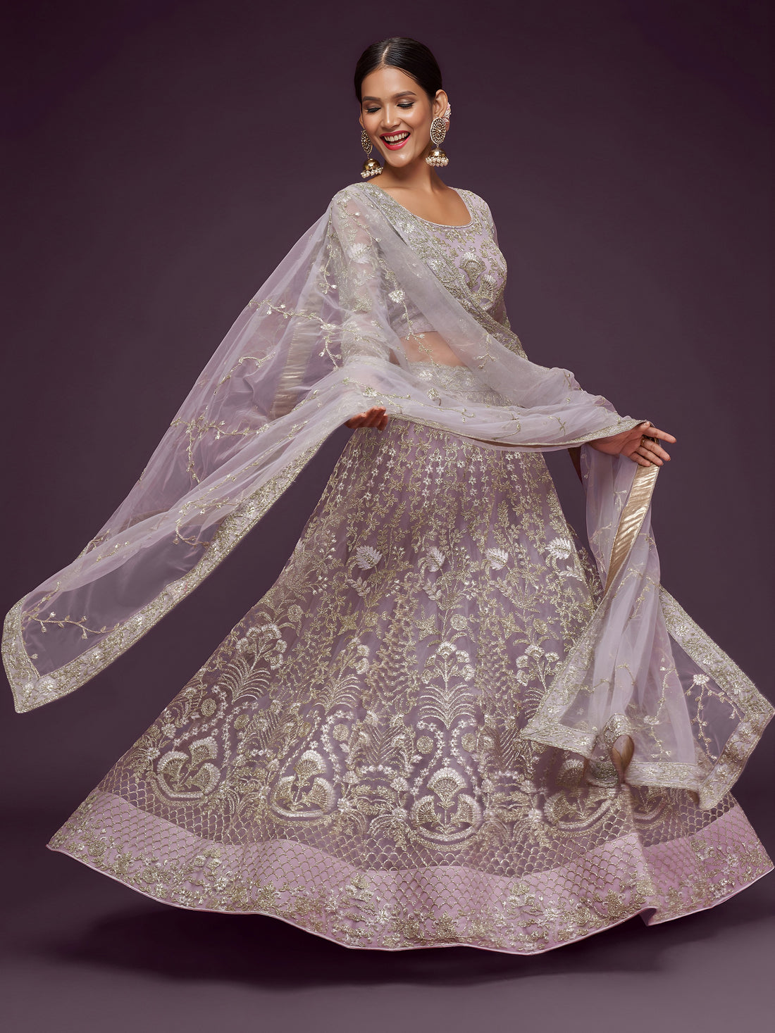 Attractive Lilac Embroidered Soft Net Wedding Wear Lehenga Choli