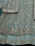 Fetching Aqua Blue Embroidered Soft Net Lehenga Choli With Dupatta