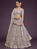 Precious Lilac Embroidered Soft Net Lehenga Choli With Dupatta
