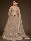 Cute Royal Beige Embroidered Soft Net Engagement Wear Lehenga Choli