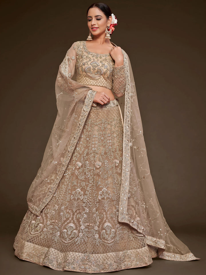 Cute Royal Beige Embroidered Soft Net Engagement Wear Lehenga Choli