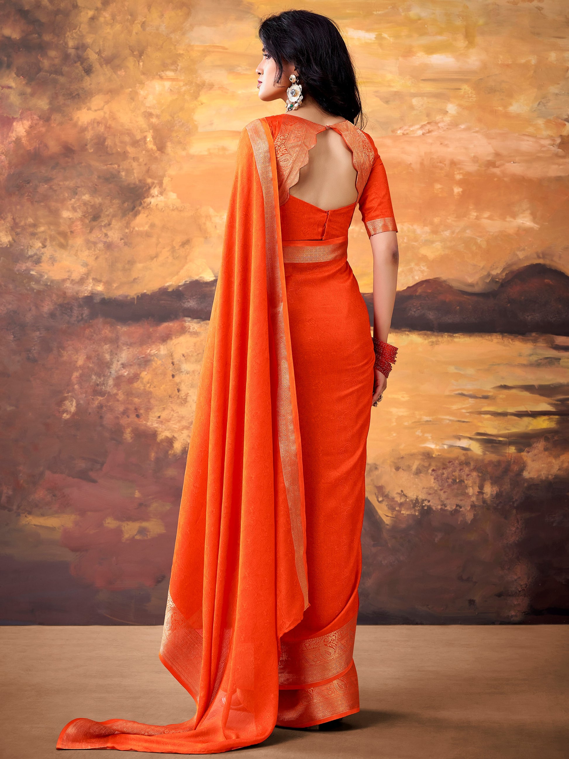 Gorgeous Orange Zari Weaving Georgette  Festive Wear Saree With Blouse
