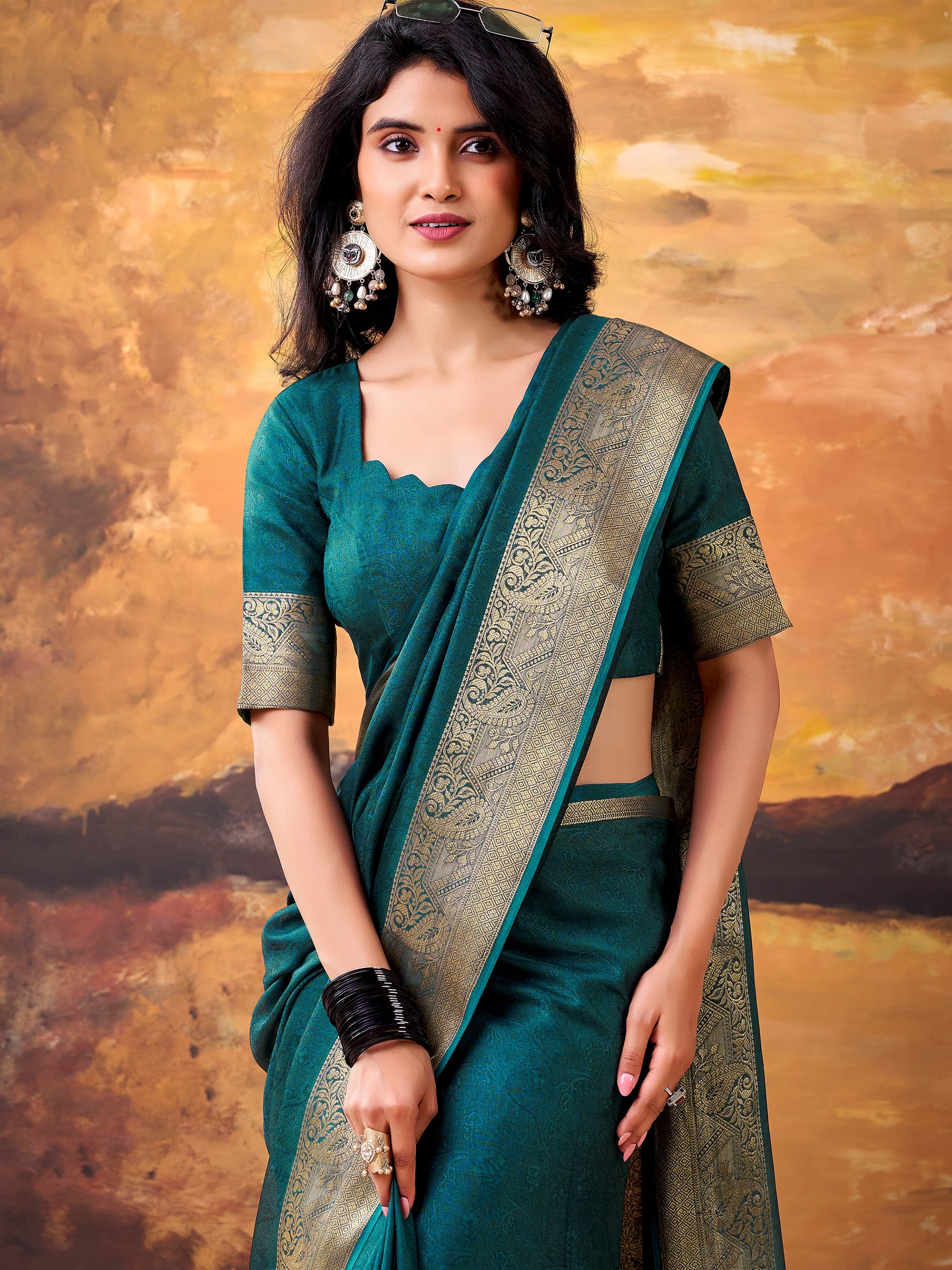 Fabulous Teal Green Zari Weaving Georgette Festive Wear Saree With Blouse