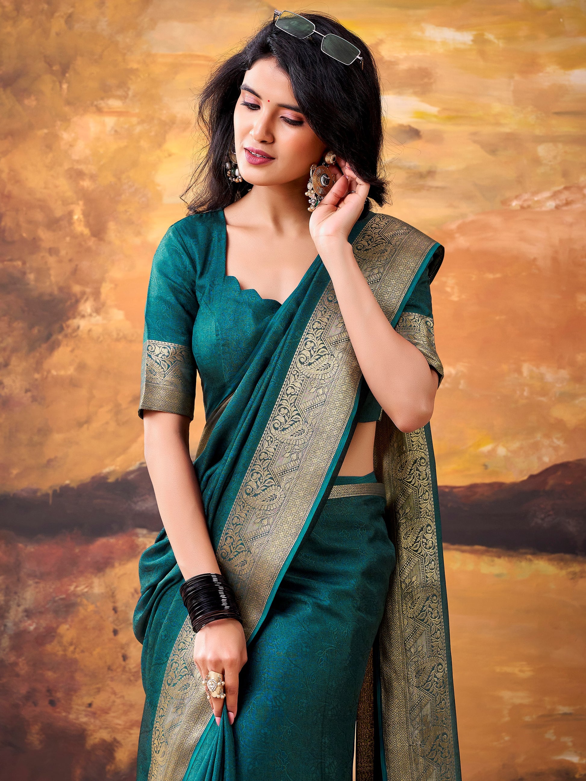 Fabulous Teal Green Zari Weaving Georgette Festive Wear Saree With Blouse