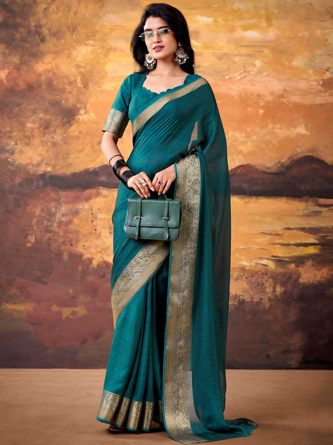 Fabulous Teal Green Zari Weaving Georgette Festive Wear Saree With Blouse