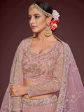 Appealing Pearl Pink Embroidered Soft Net Wedding Wear Lehenga Choli