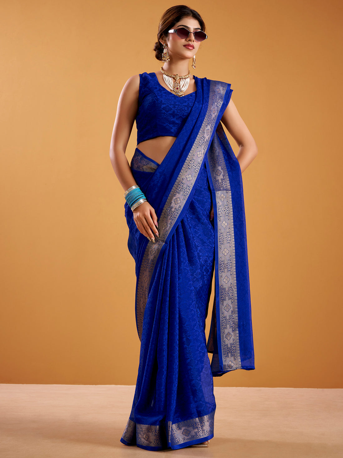 Marvelous Royal Blue Zari Weaving Georgette Function Wear Saree