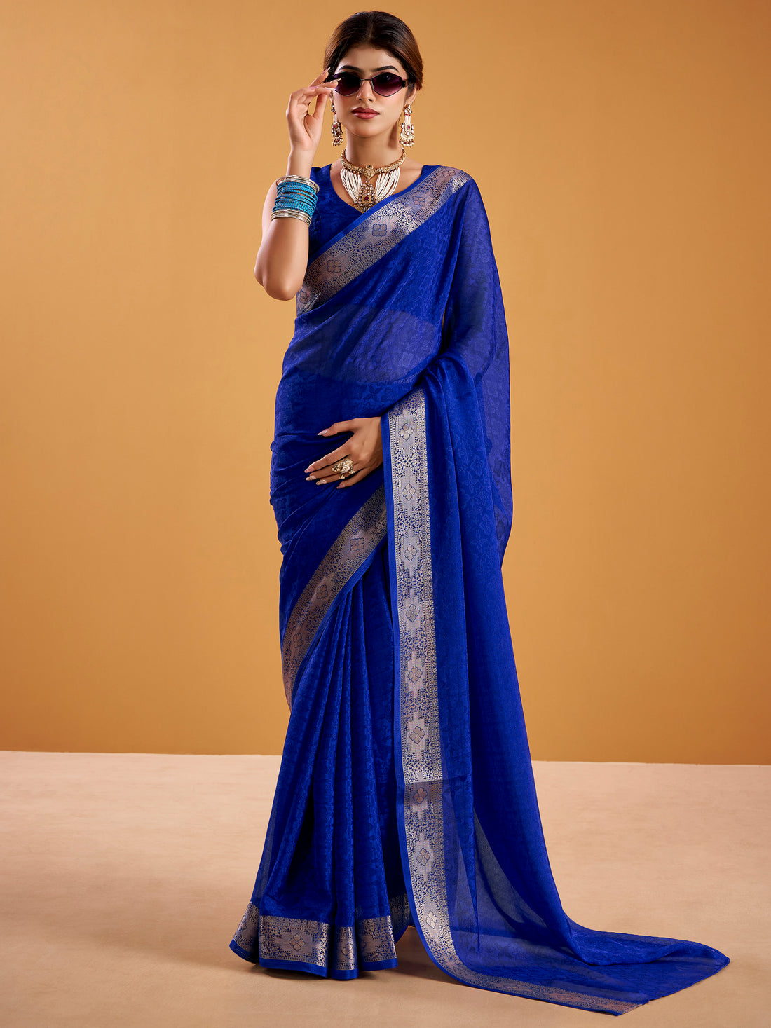 Marvelous Royal Blue Zari Weaving Georgette Function Wear Saree