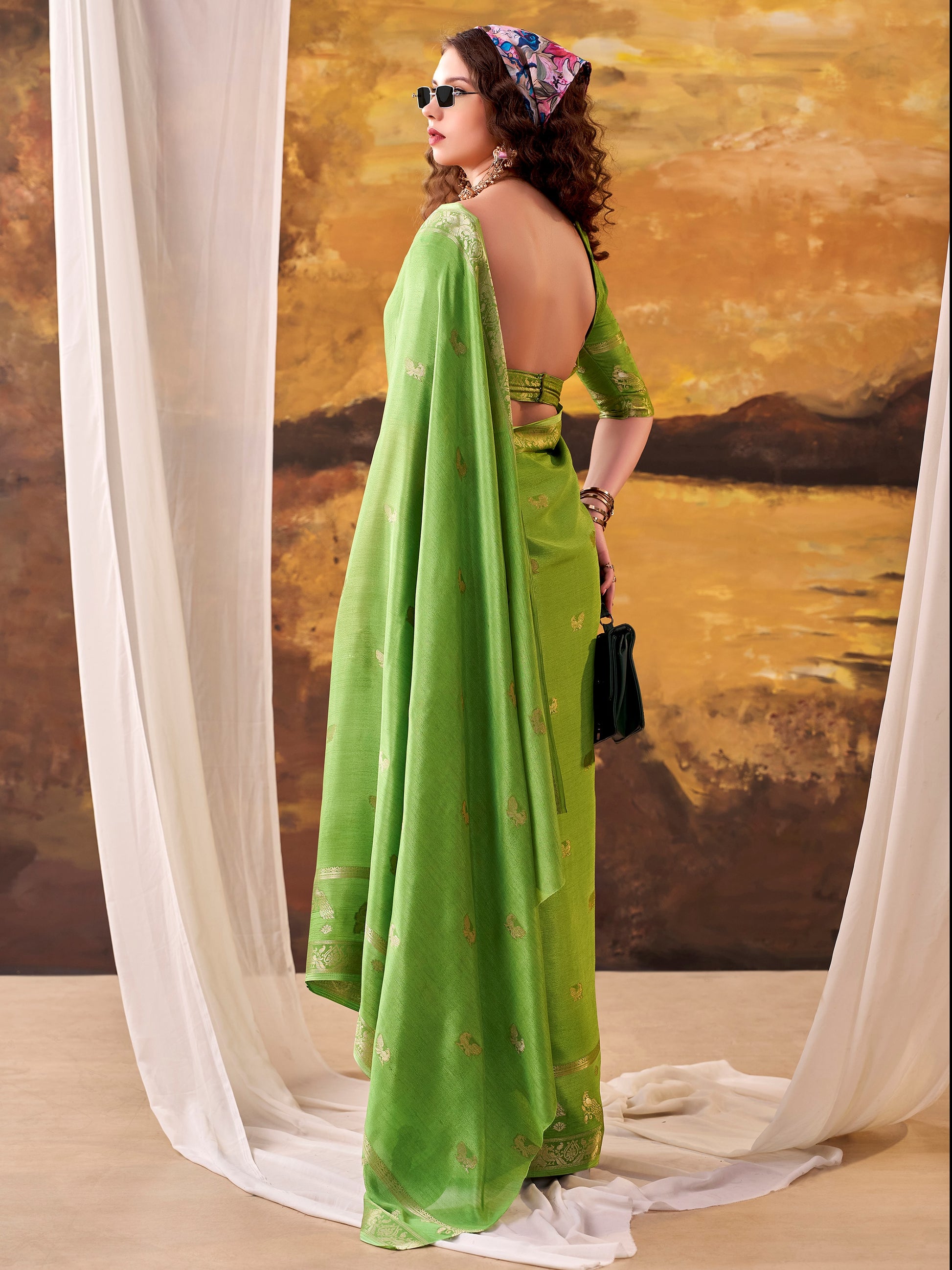 Alluring Parrot Green Zari Weaving Crepe Festive Wear Saree With Blouse