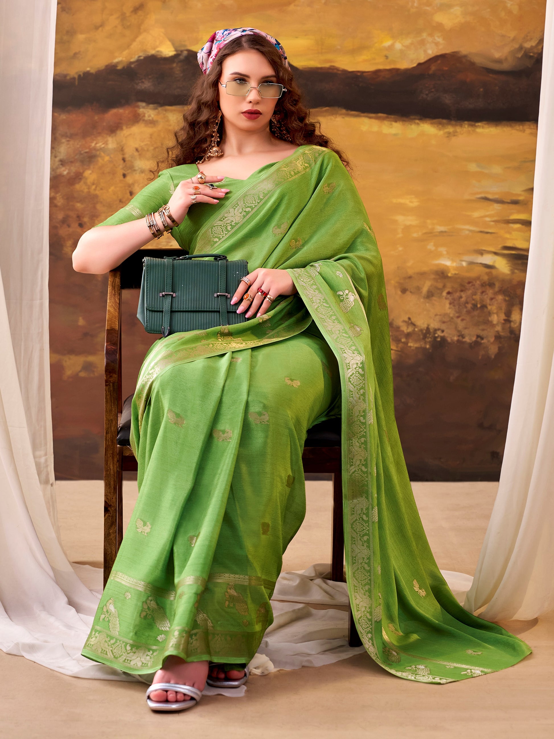 Alluring Parrot Green Zari Weaving Crepe Festive Wear Saree With Blouse
