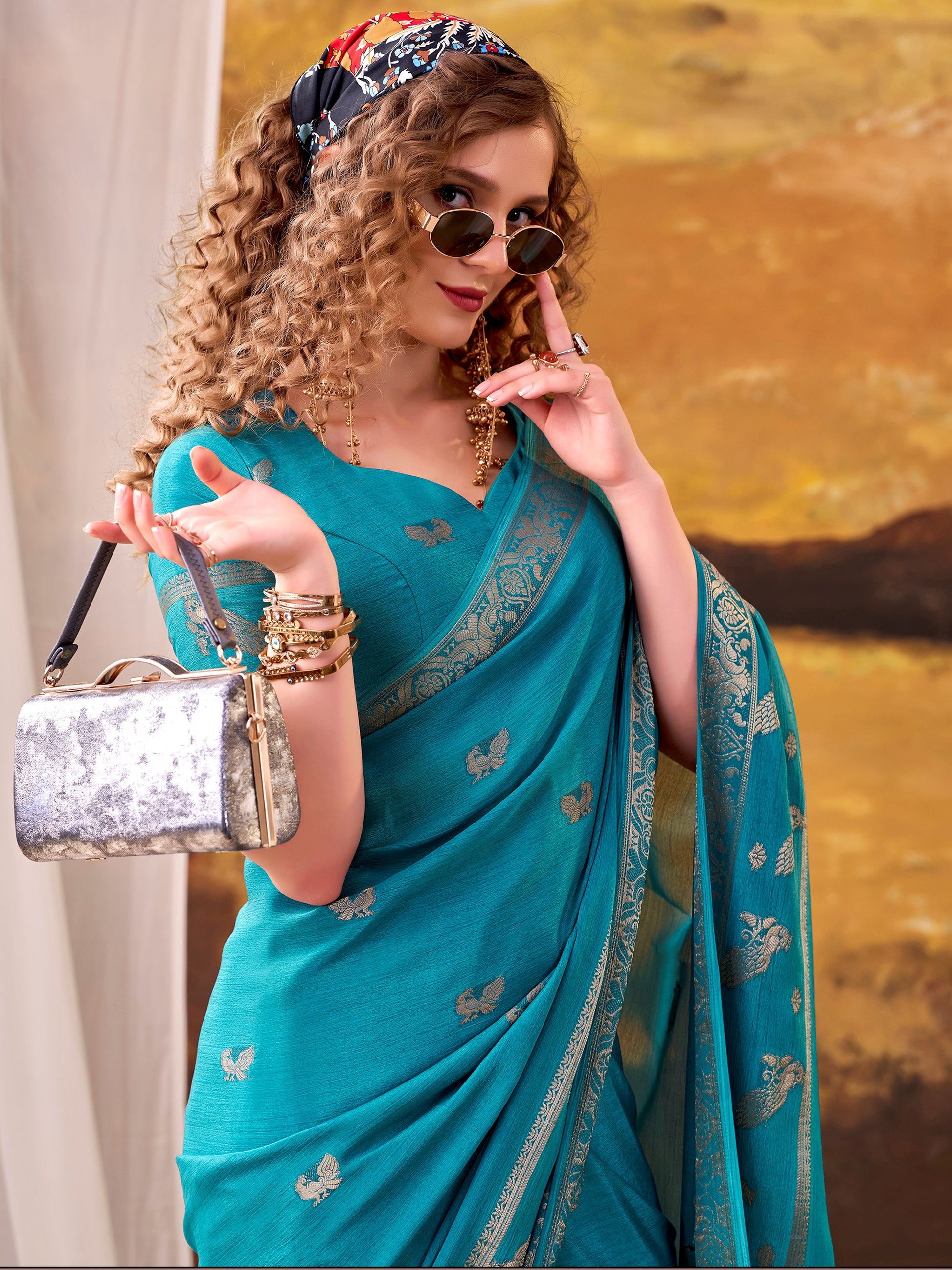 Stunning Teal Blue Zari Weaving Crepe Festive Wear Saree With Blouse