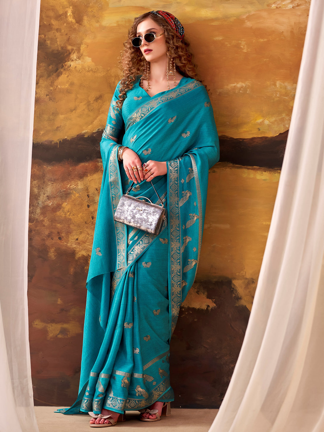 Stunning Teal Blue Zari Weaving Crepe Festive Wear Saree With Blouse