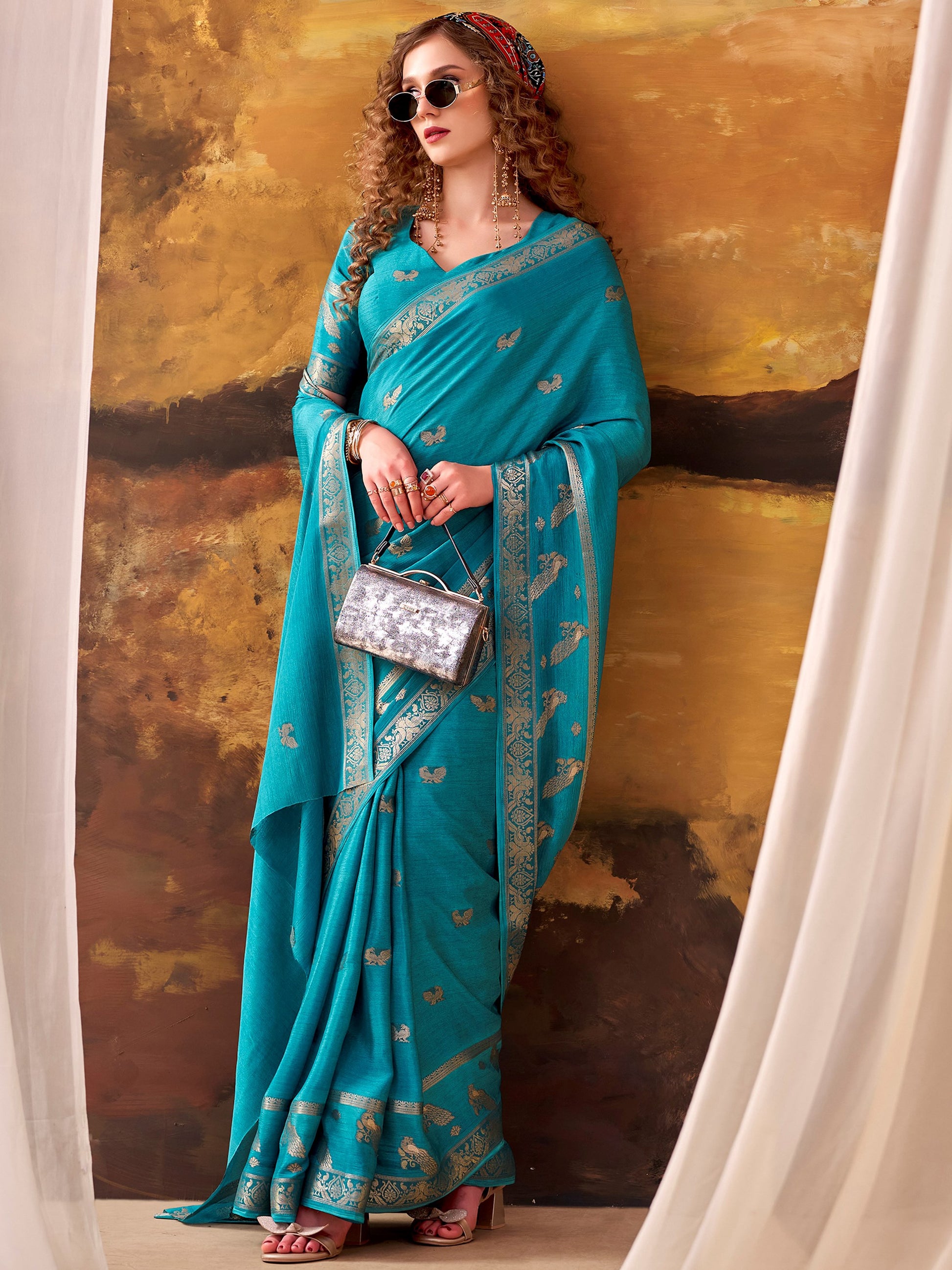 Stunning Teal Blue Zari Weaving Crepe Festive Wear Saree With Blouse