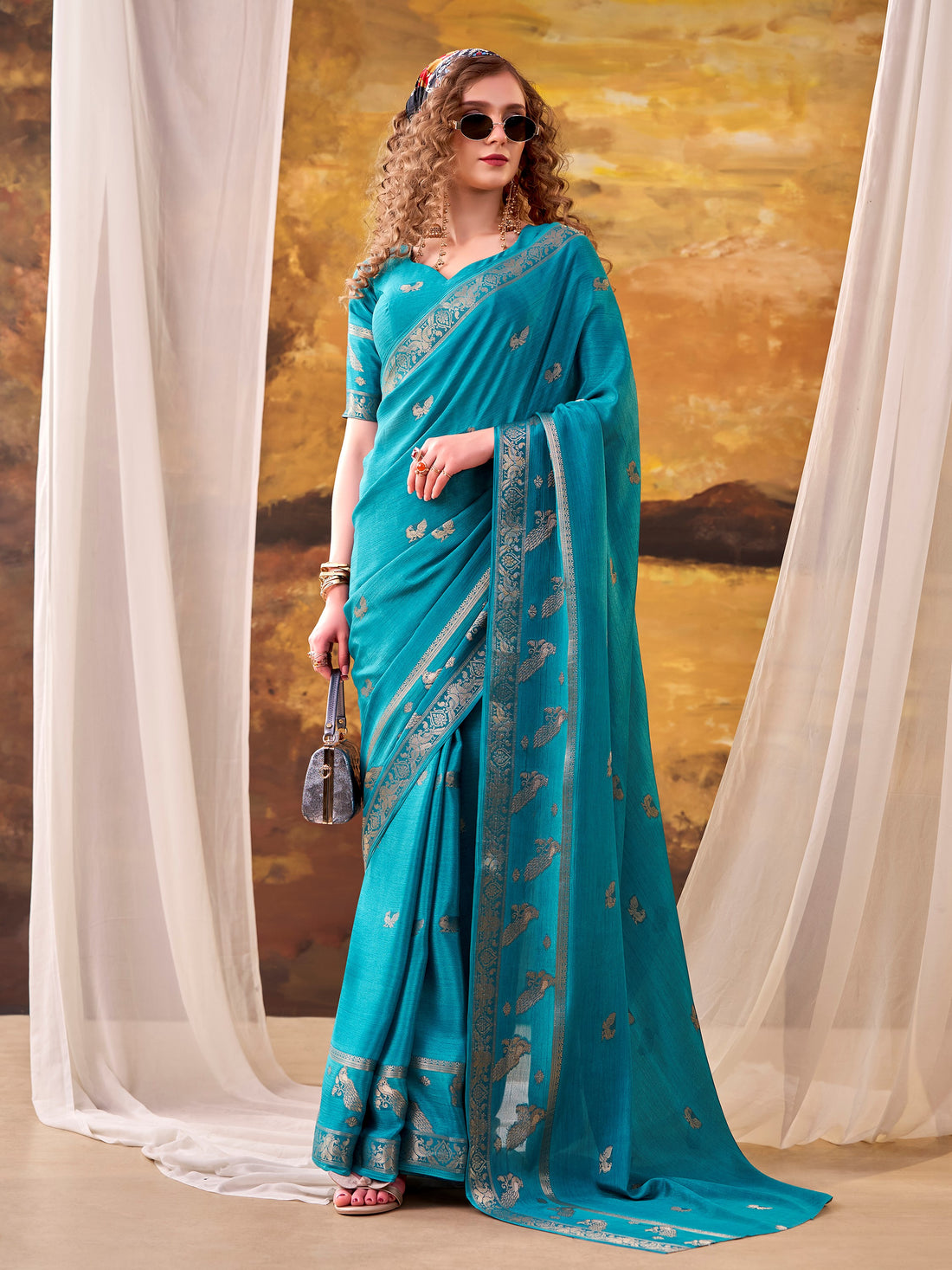 Stunning Teal Blue Zari Weaving Crepe Festive Wear Saree With Blouse