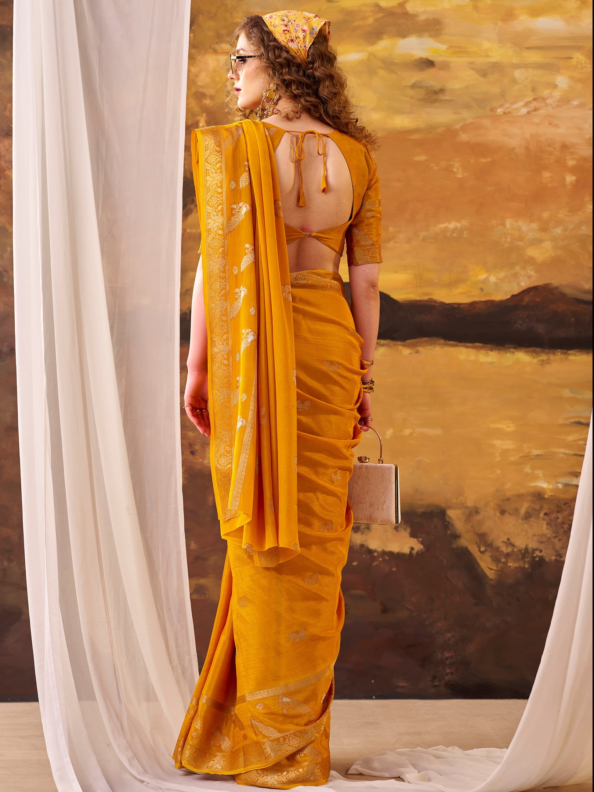Awesome Mustard Yellow Zari Weaving Crepe Festive Wear Saree With Blouse