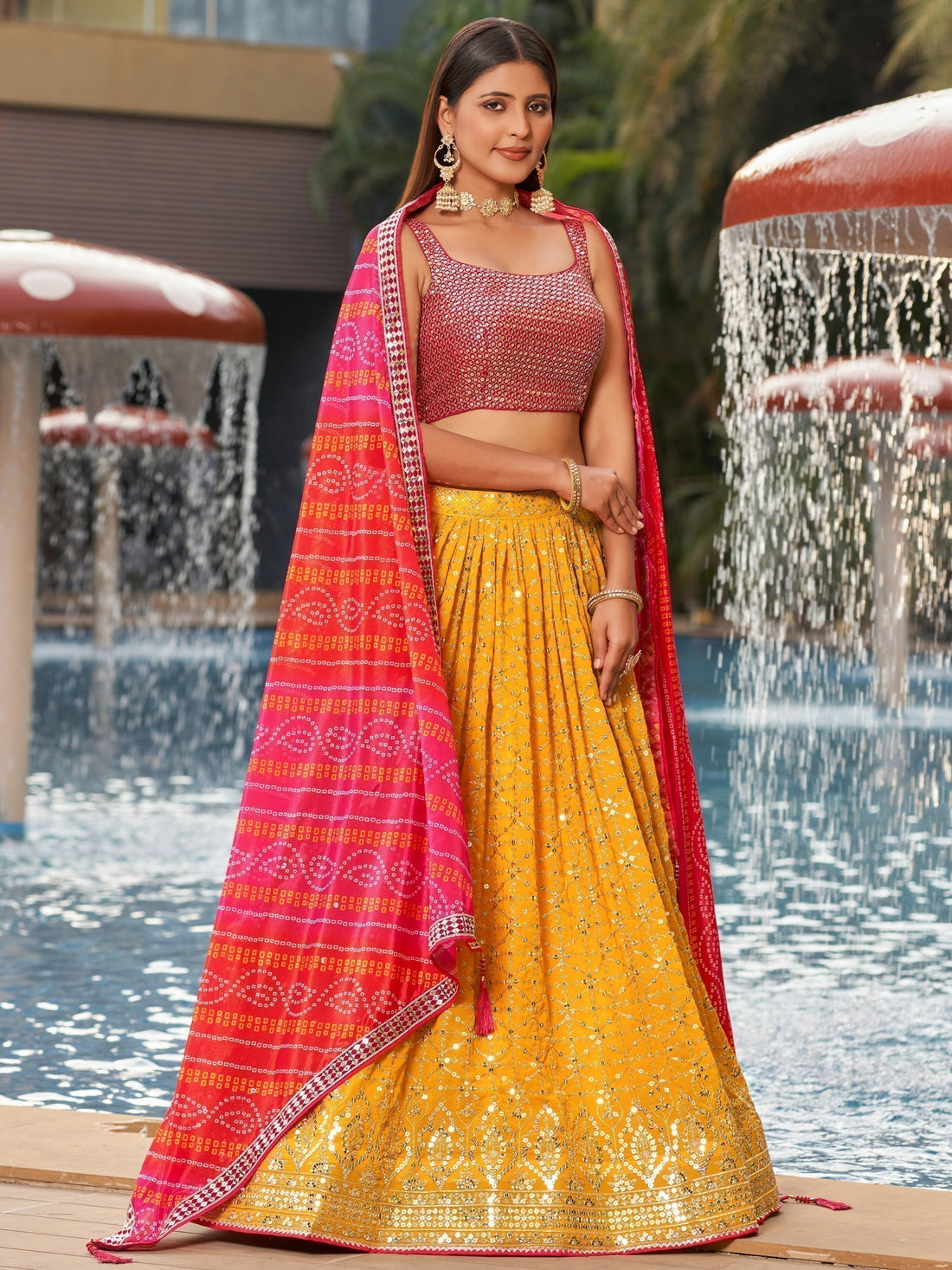 Ravishing Yellow Sequins Georgette Sangeet Wear Lehenga Choli