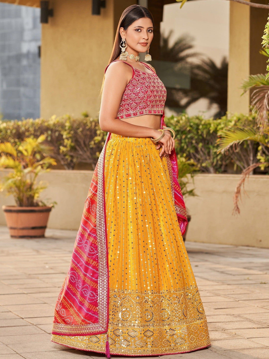 Fascinating Yellow Sequins Georgette Traditional Lehenga Choli