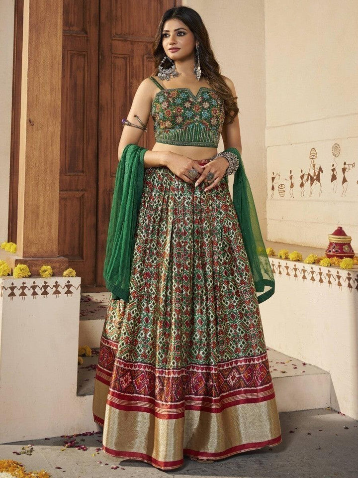 Awesome Green Patola Silk Sangeet Wear Lehenga With Embroidered Choli