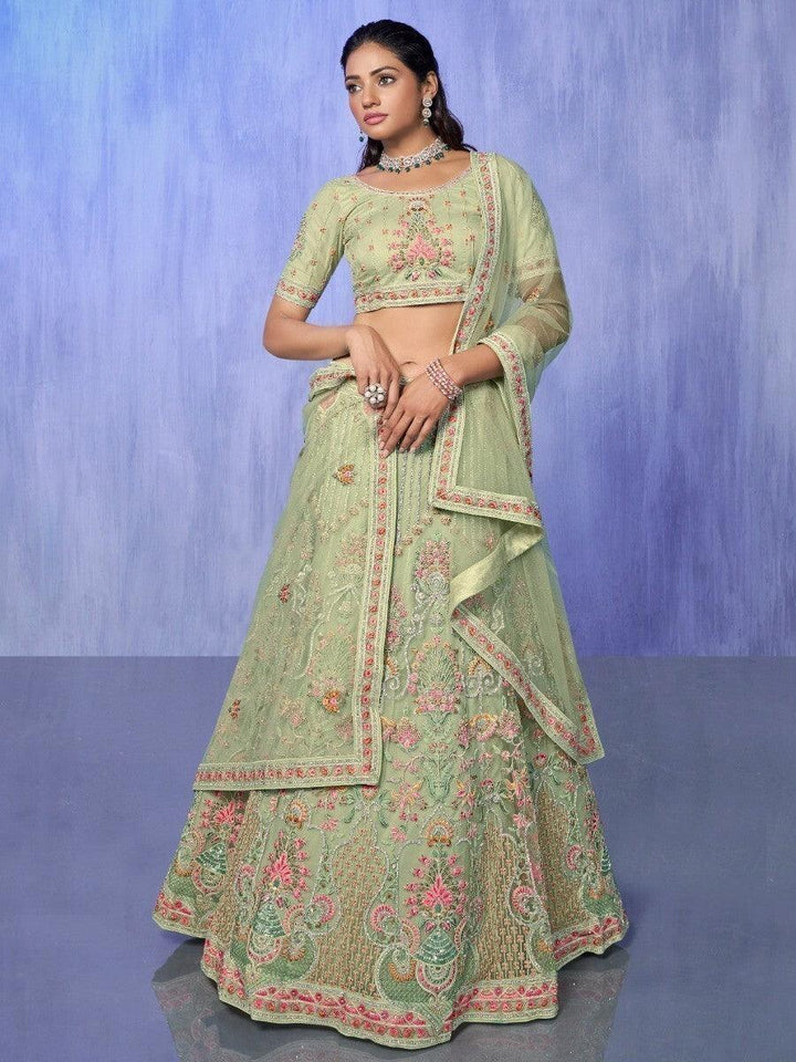 Astonishing Green Embroidered Net Lehenga Choli With Dupatta