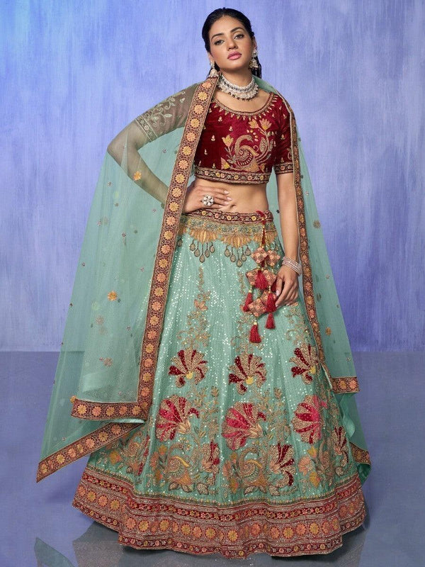 Enticing Turquoise Embroidered Velvet Lehenga Choli With Dupatta
