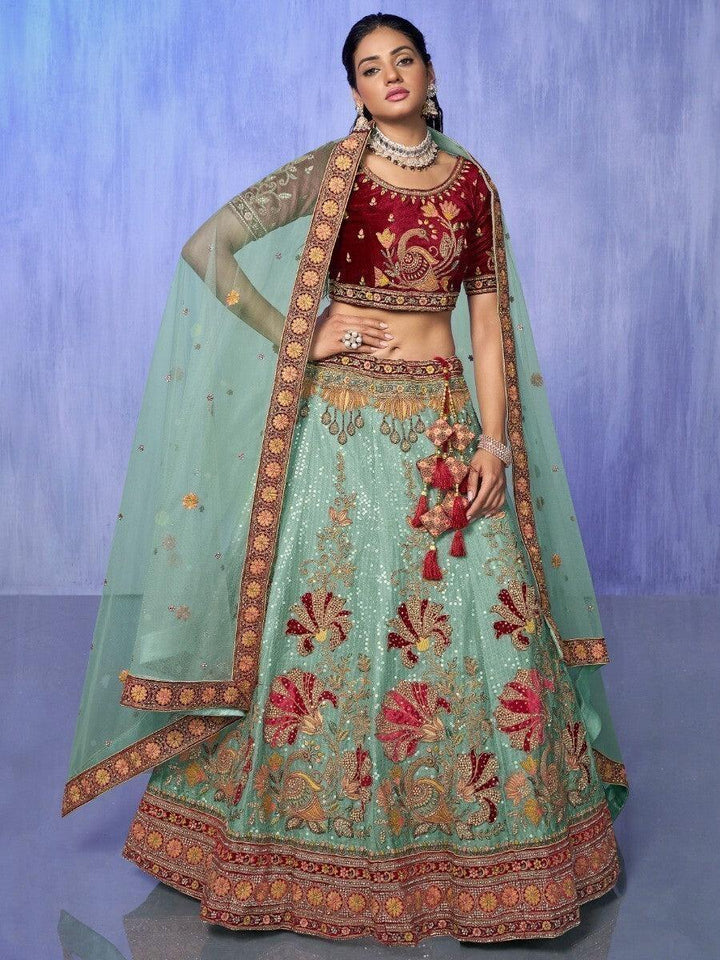 Enticing Turquoise Embroidered Velvet Lehenga Choli With Dupatta