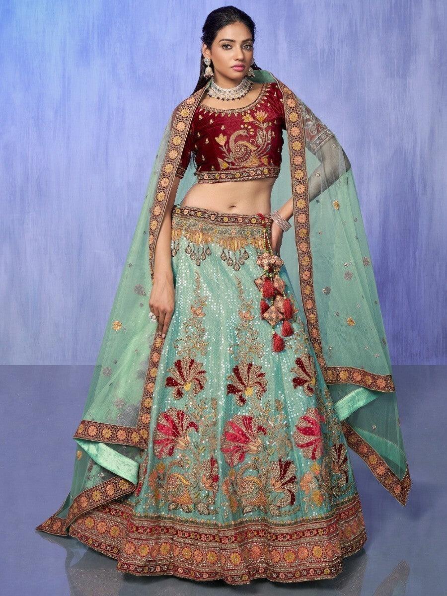 Enticing Turquoise Embroidered Velvet Lehenga Choli With Dupatta