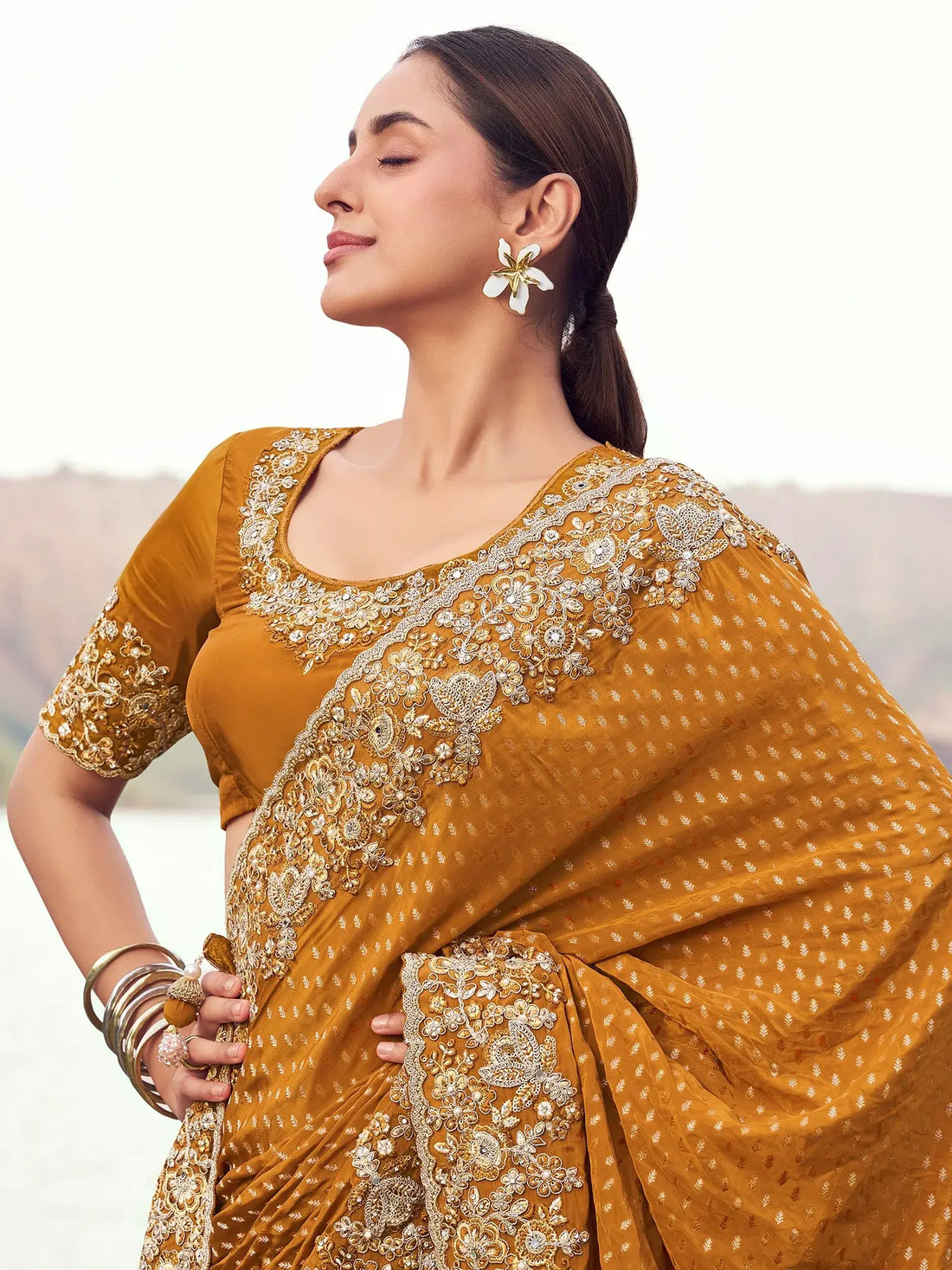 Attractive Mustard Yellow Zari Weaving Satin Haldi Wear Saree With Blouse