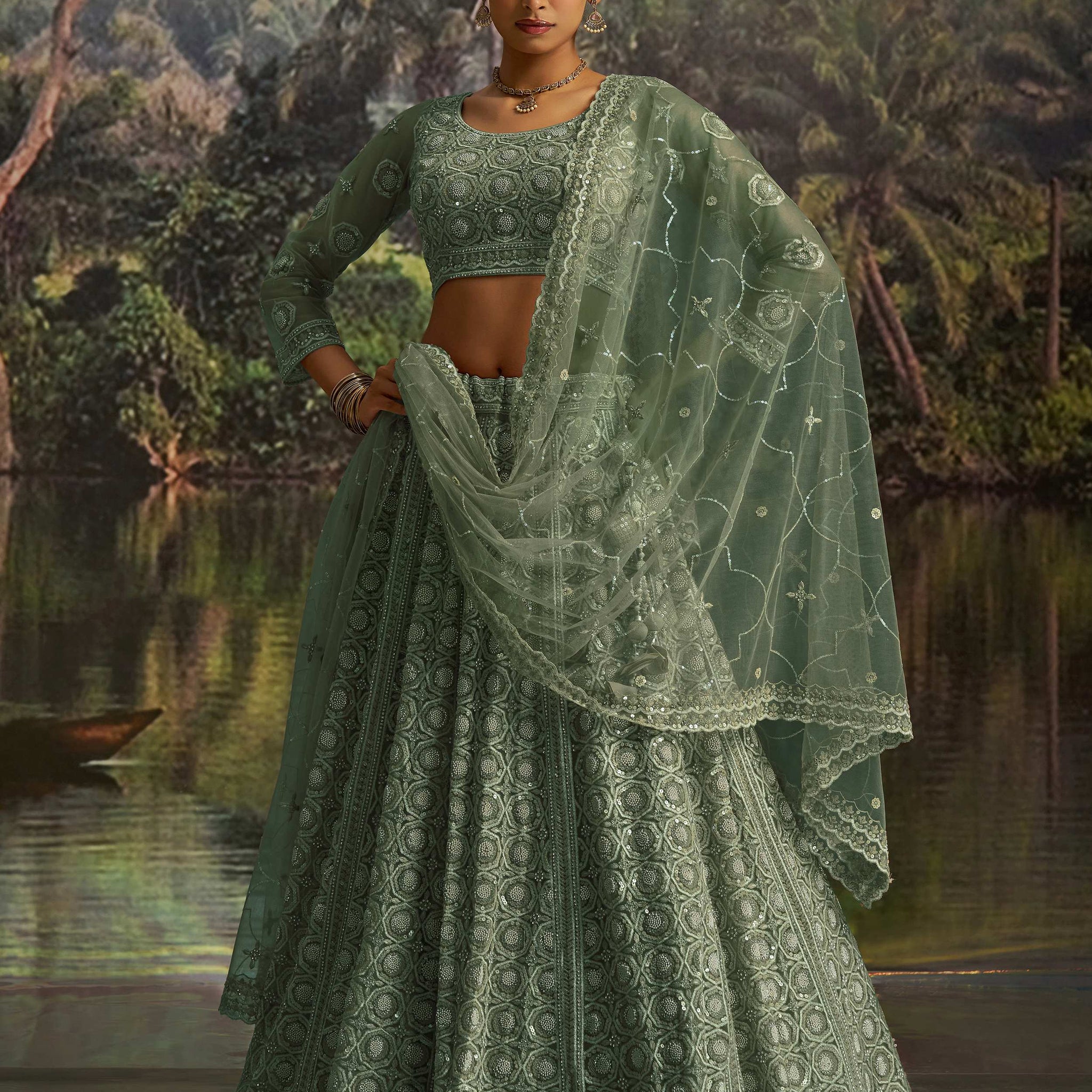 Outstanding Green Thread Work Net Reception Wear Lehenga Choli With Dupatta