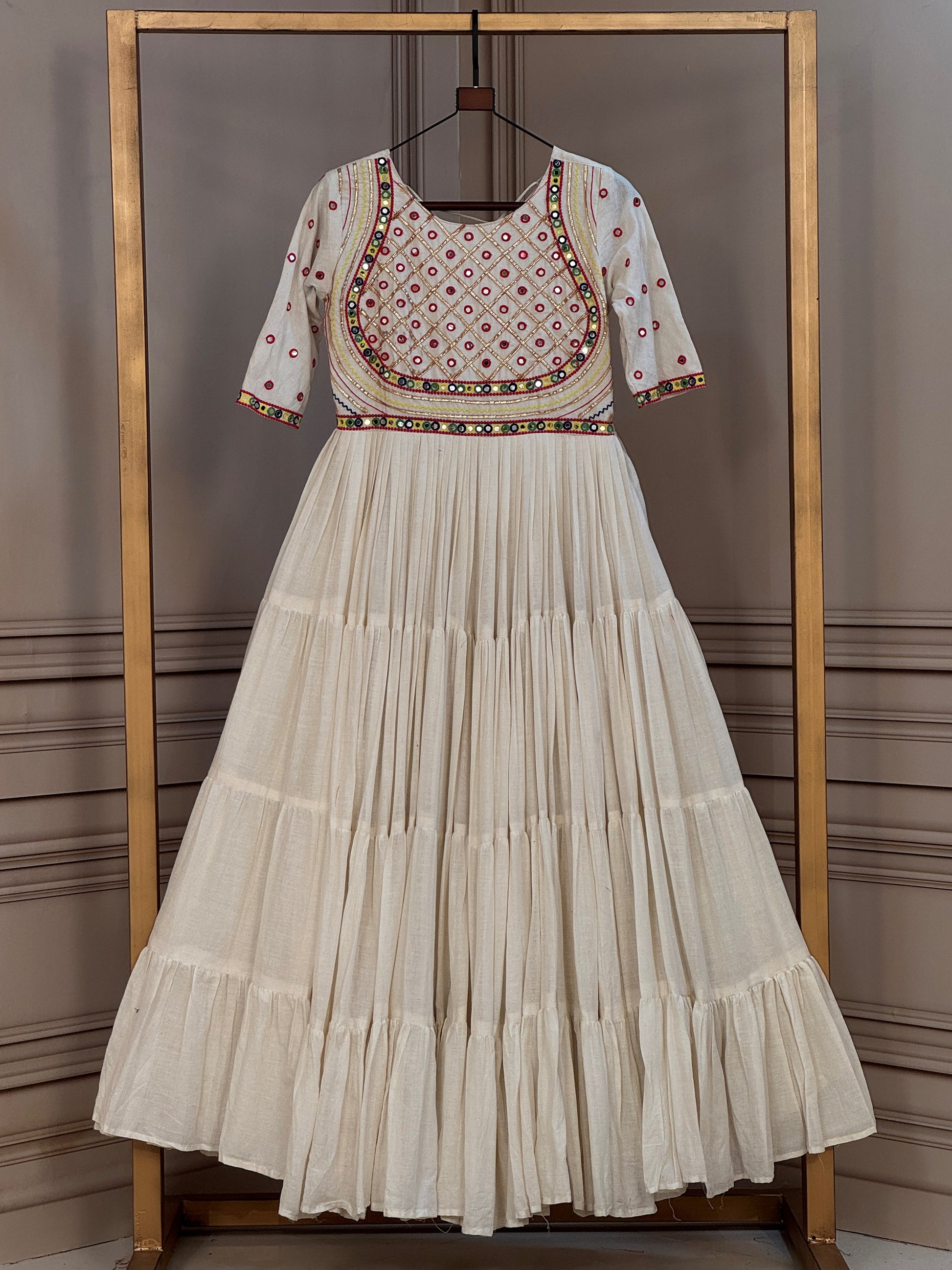Graceful Off White Mirror Work Cotton Navratri Wear Gown