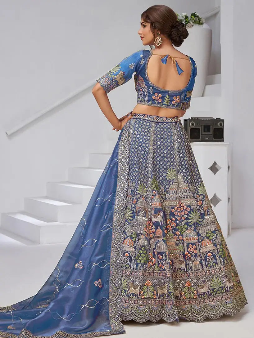 Charming Navy Blue Zari Embroidered Organza Engagement Wear Lehenga Choli