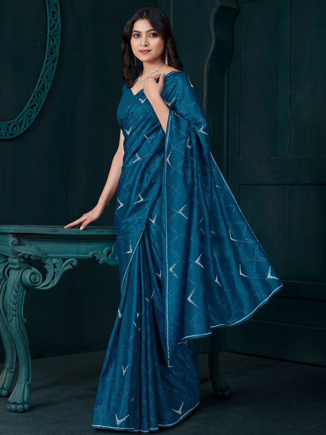 Fascinating Teal Blue Crepe Silk Party Wear Saree With Blouse