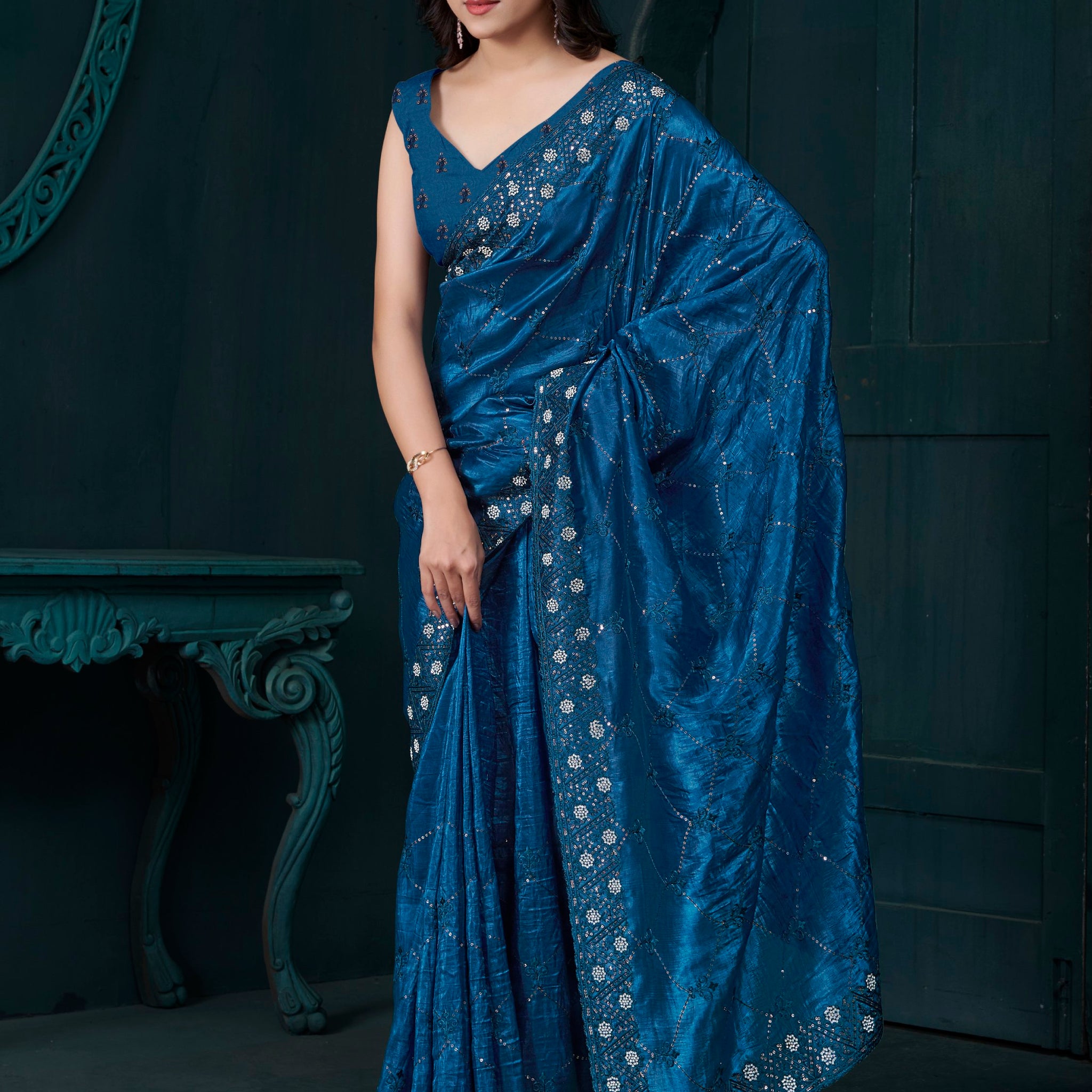 Bewitching Teal Blue Thread Embroidered Silk Party Wear Saree