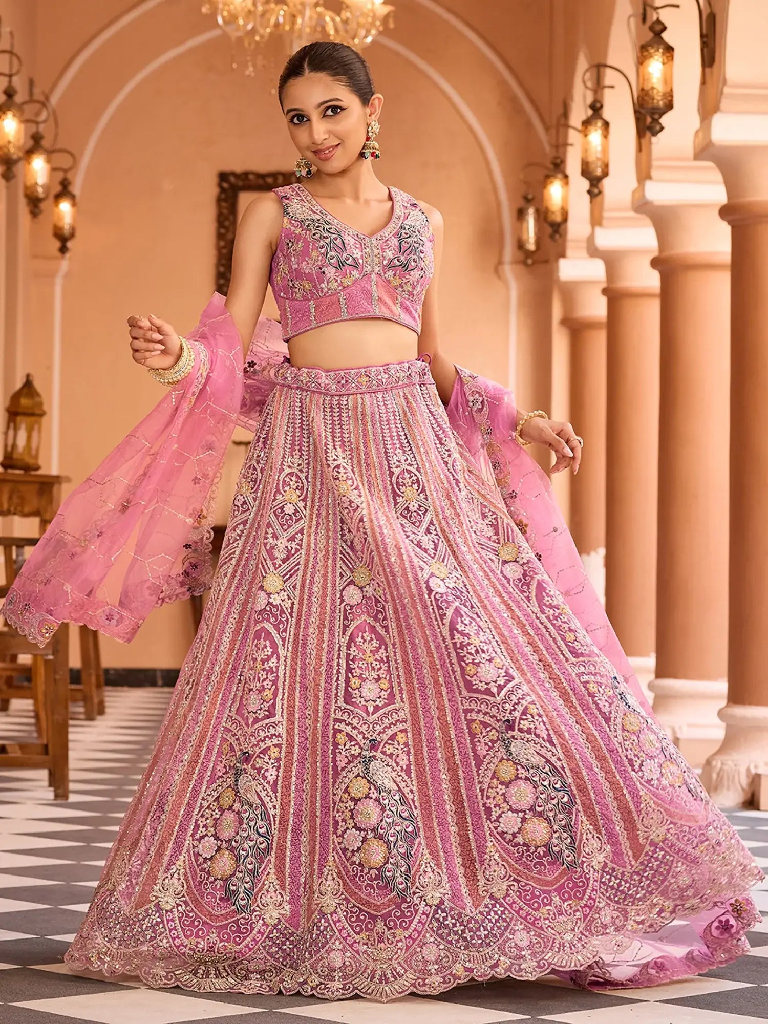 Charming Pink Floral Embroidery Net Engagement Wear Lehenga Choli With Dupatta