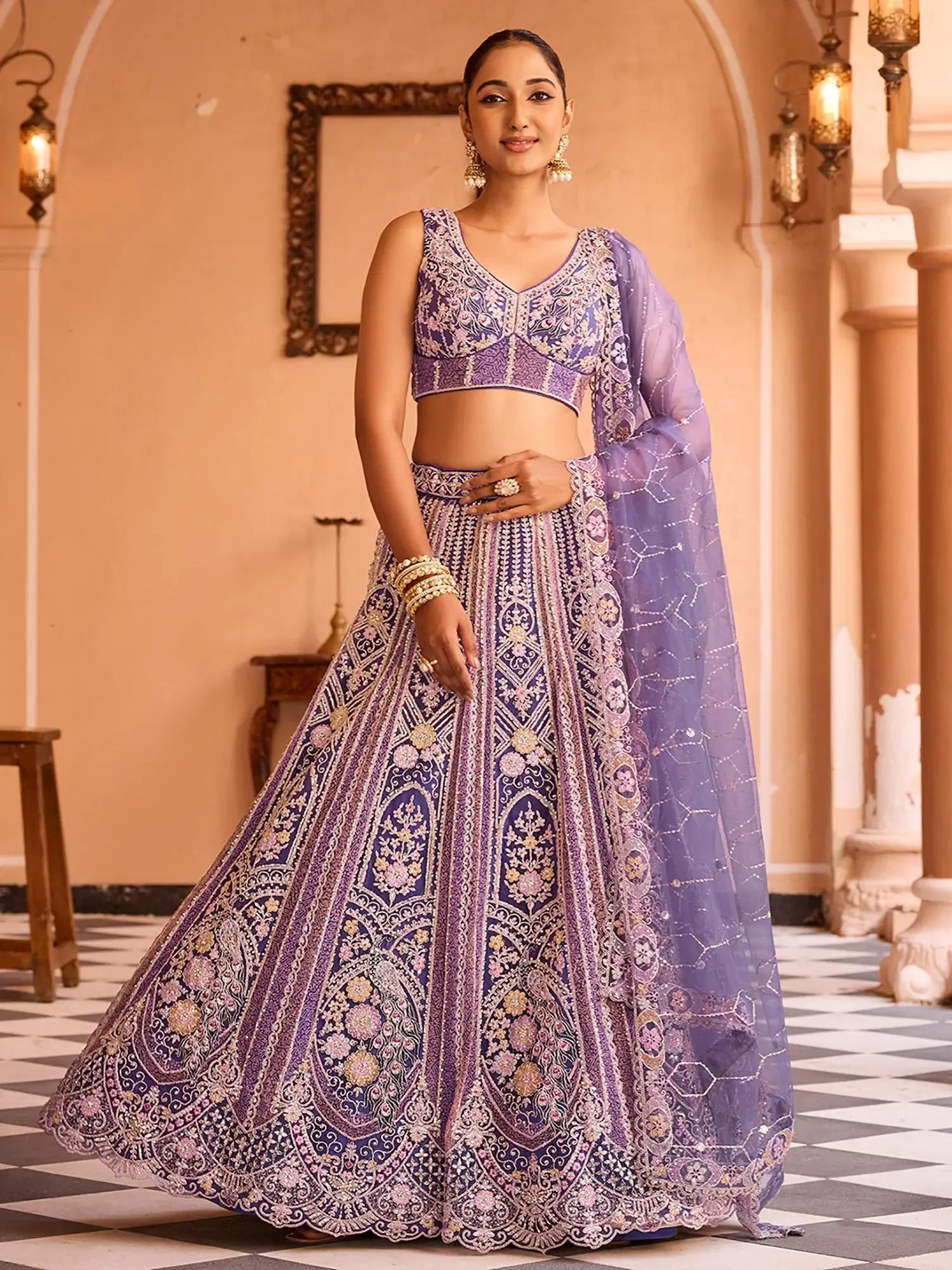 Beautiful Purple Thread Embroidery Net Designer Lehenga Choli With Dupatta