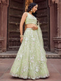 Pretty Pista Green Sequins Embroidery Net Mehendi Wear Lehenga With Blouse