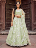 Pretty Pista Green Sequins Embroidery Net Mehendi Wear Lehenga With Blouse