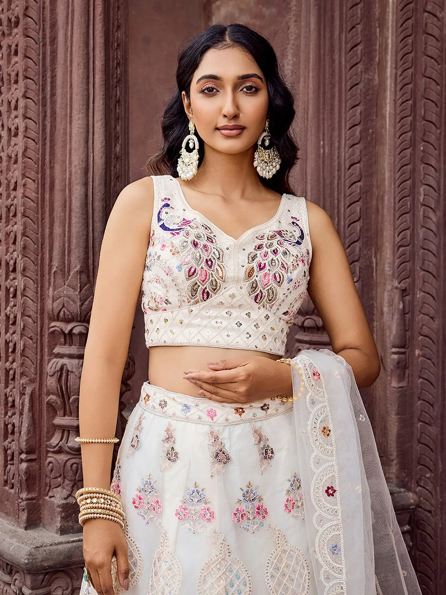 Wonderful Cream Floral Embroidered Net Evening Wear Lehenga Choli