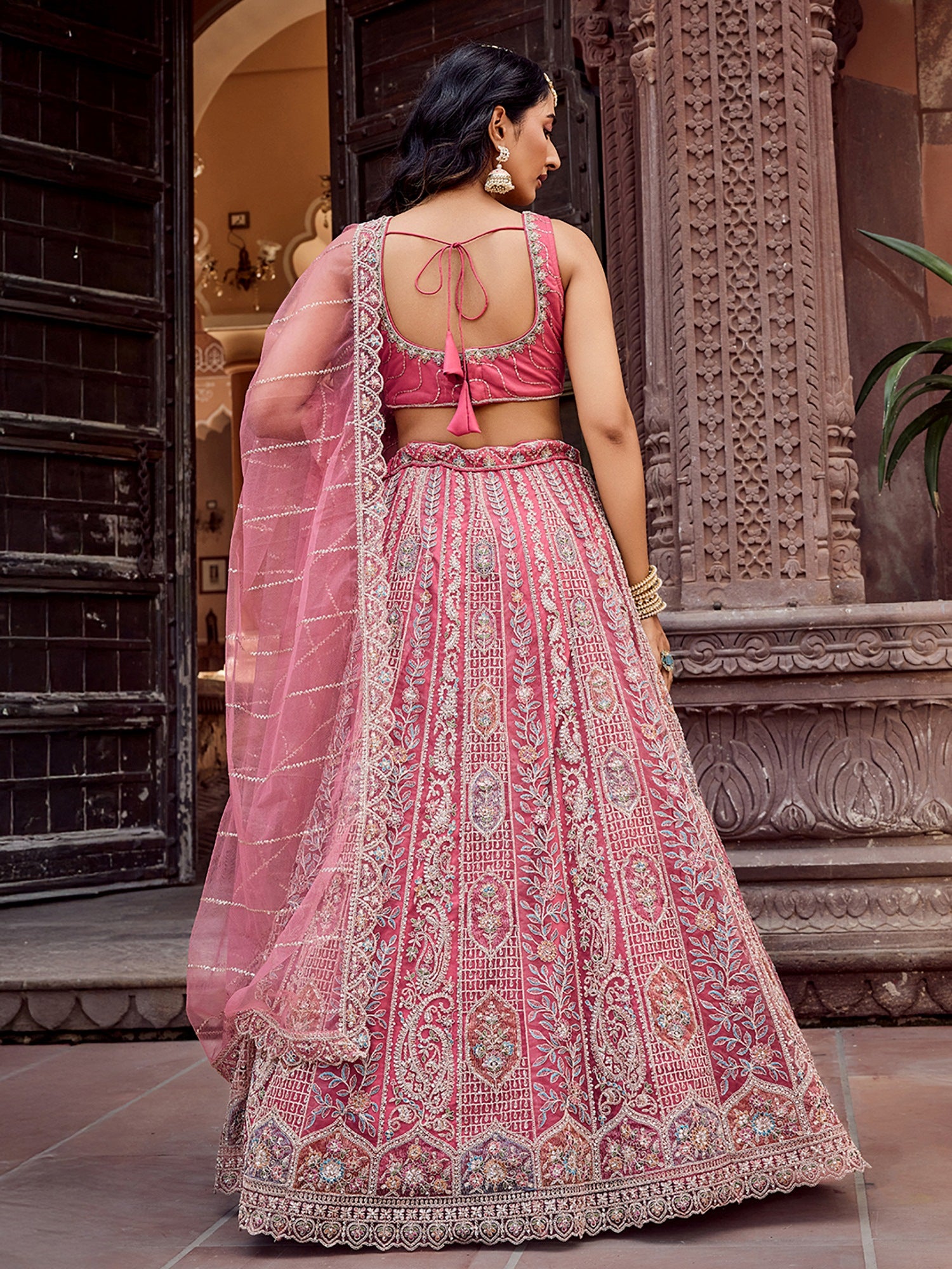 Regal Rose Gold Net Embroidered Engagement Wear Lehenga Choli With Dupatta