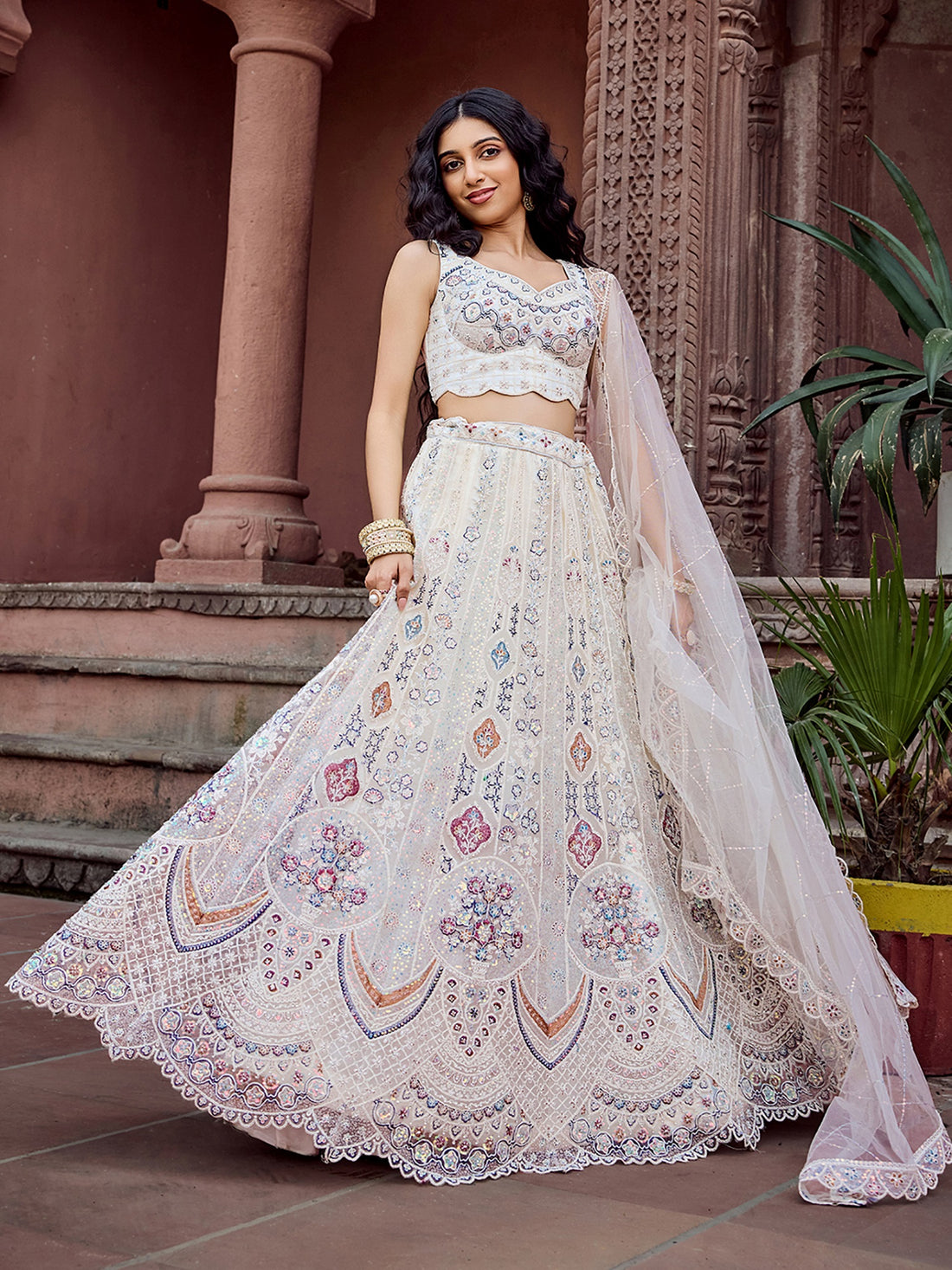 Momentous Cream Sequins Work Net Bridesmaid Lehenga Choli With Dupatta