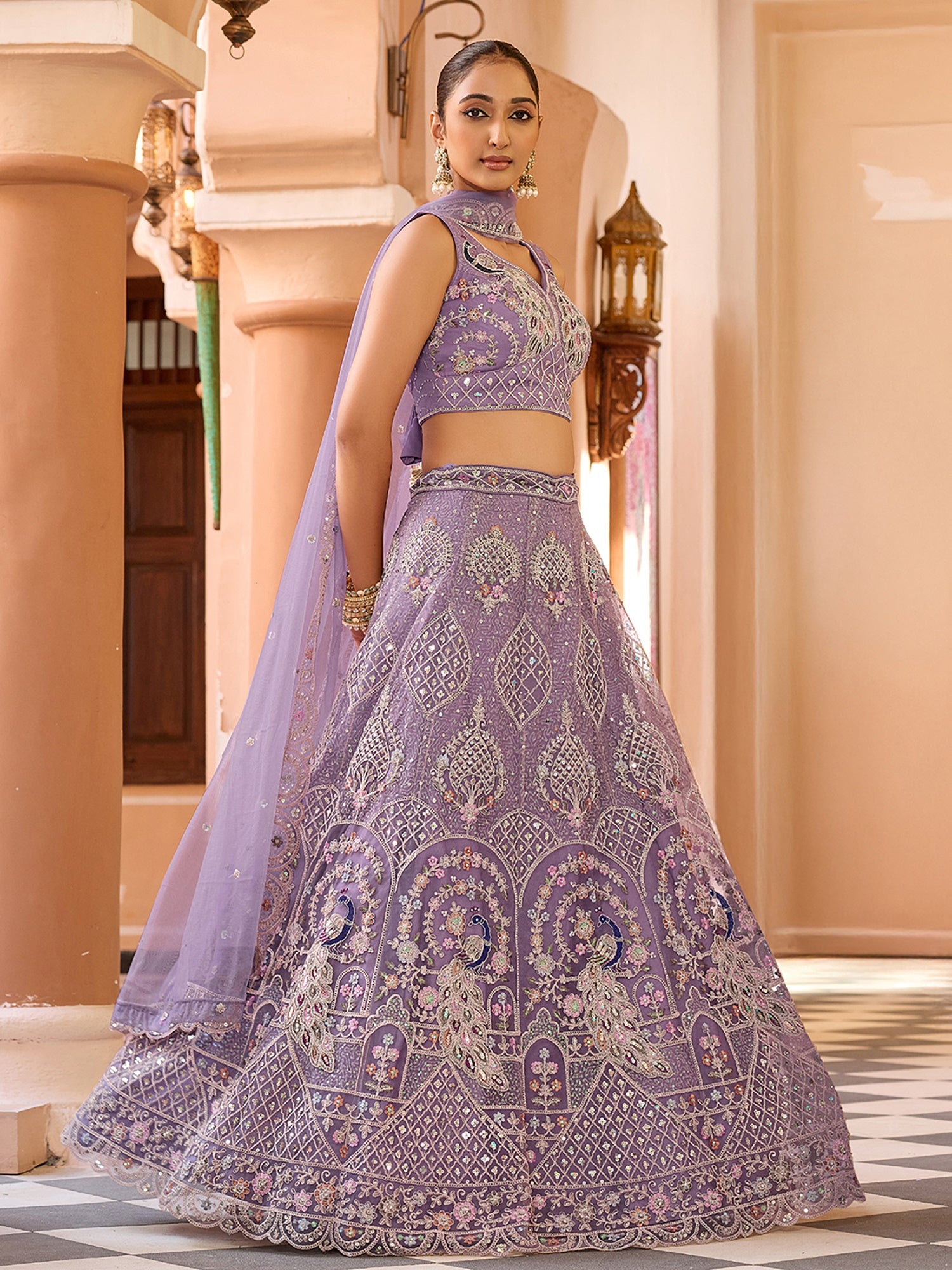 Glamours Mauve Floral Embroidered Net Reception Wear Lehenga With Blouse
