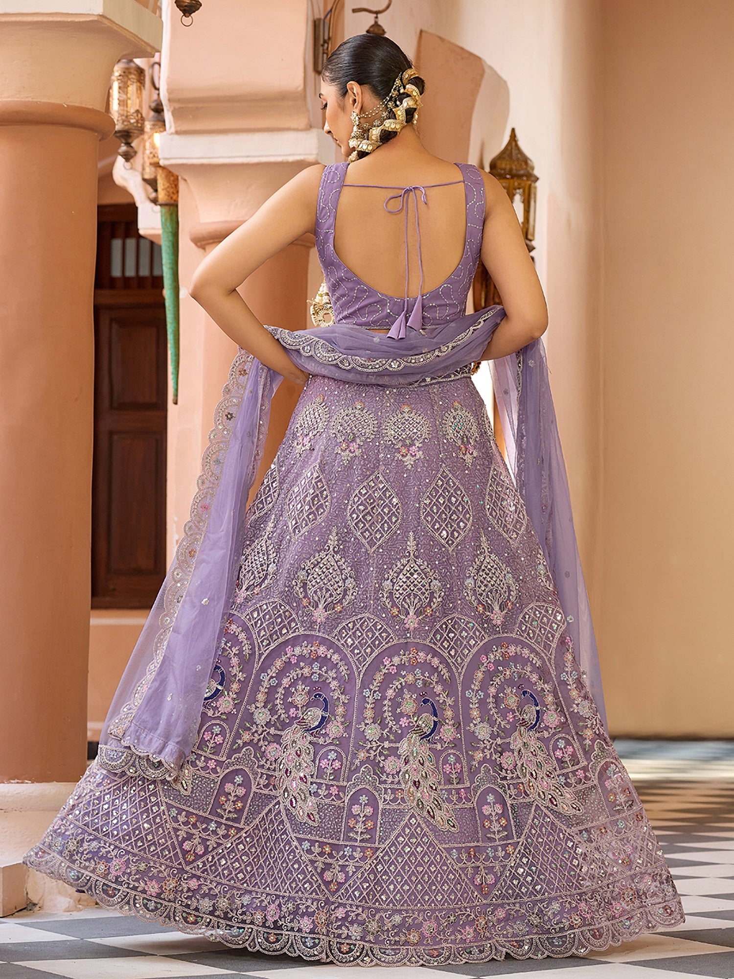 Glamours Mauve Floral Embroidered Net Reception Wear Lehenga With Blouse