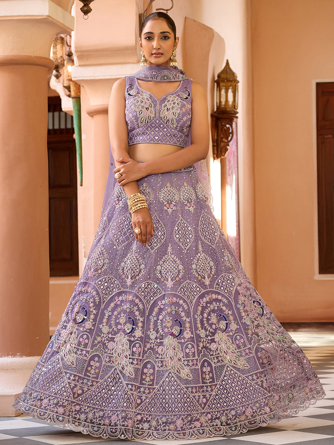 Glamours Mauve Floral Embroidered Net Reception Wear Lehenga With Blouse